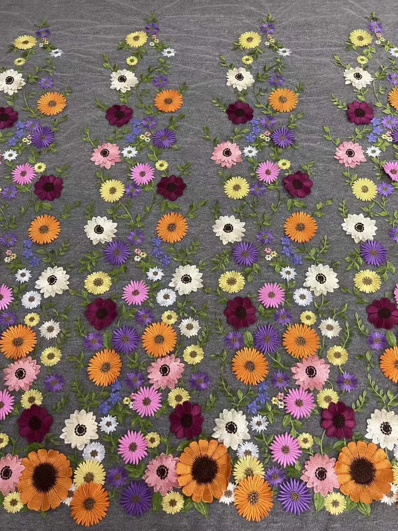 Rising daisy border · embroidered fabric — H066 — Orange, purple, pink & white