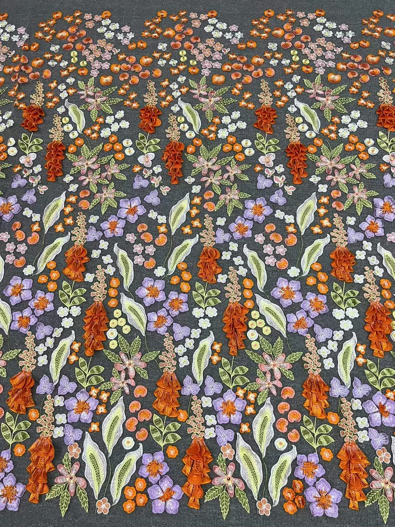 Wildflower stems · embroidered fabric — H074 — Orange, blue, cream & green