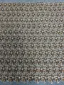 Mosaico de folhas em tons terrosos · tecido bordado — H105 — 1